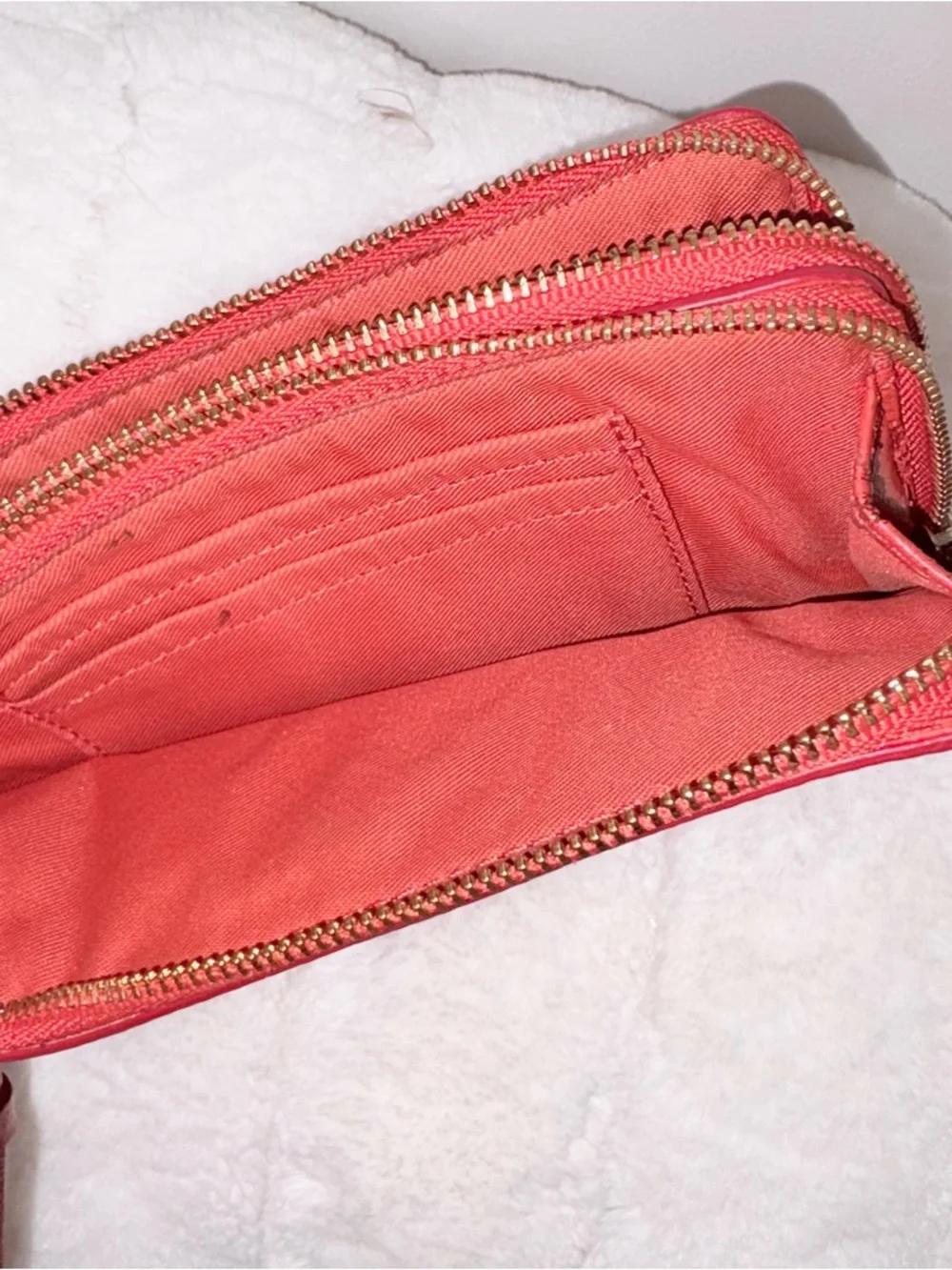 Coach orange Pebbled Leather Wristlet Clutch